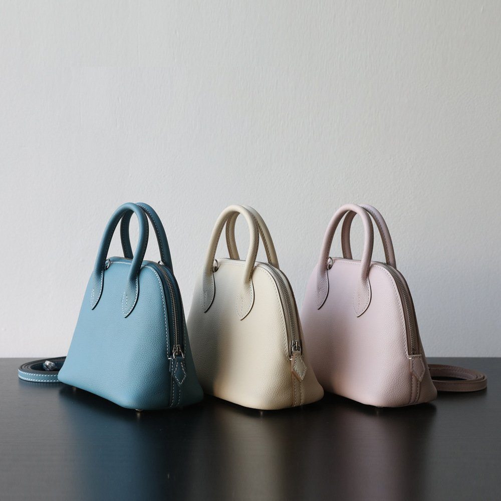 Top-Grain Cowhide Bolide Crossbody Bag in Ivory — front view