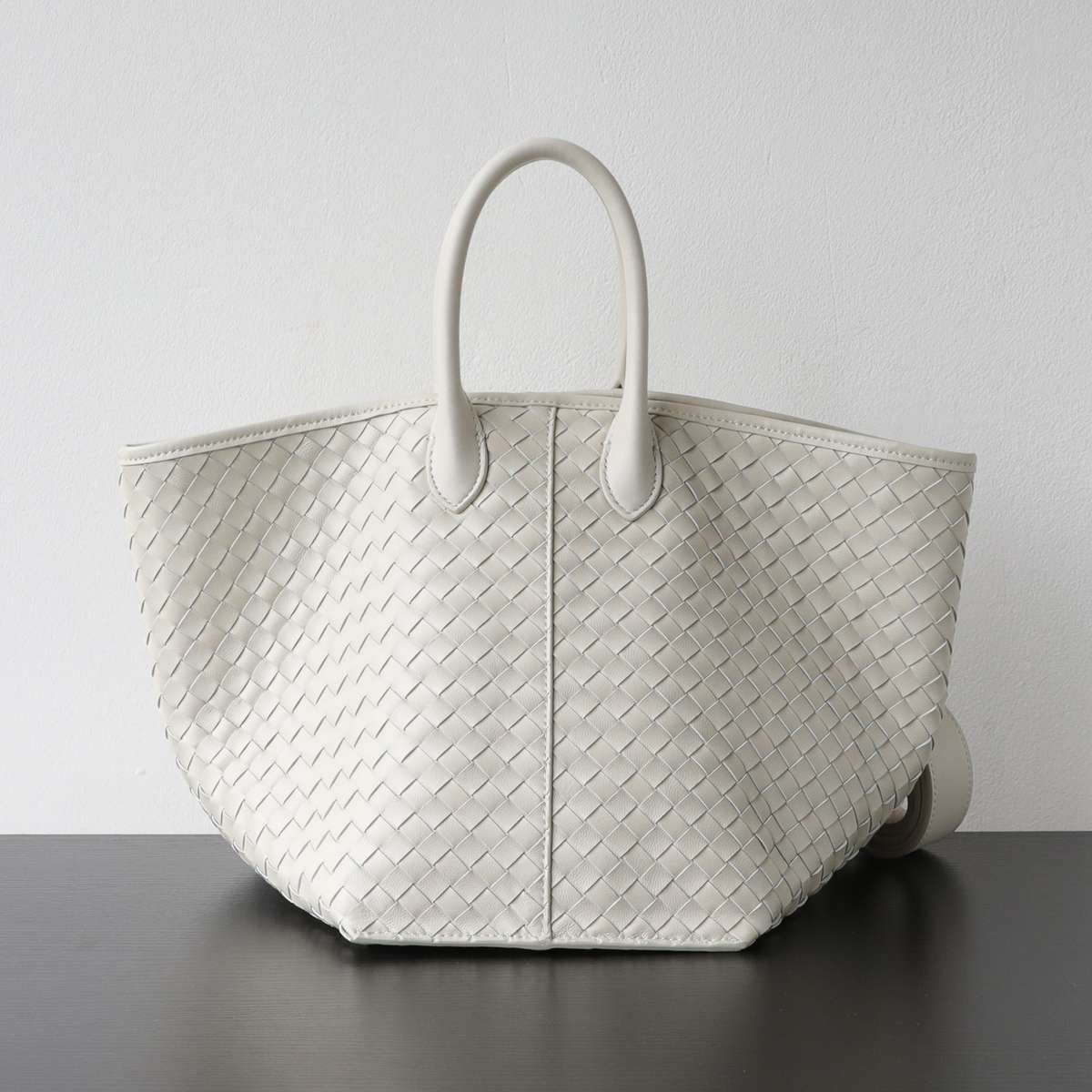 Woven Wing Leather Tote Bag in Beige — styling photo